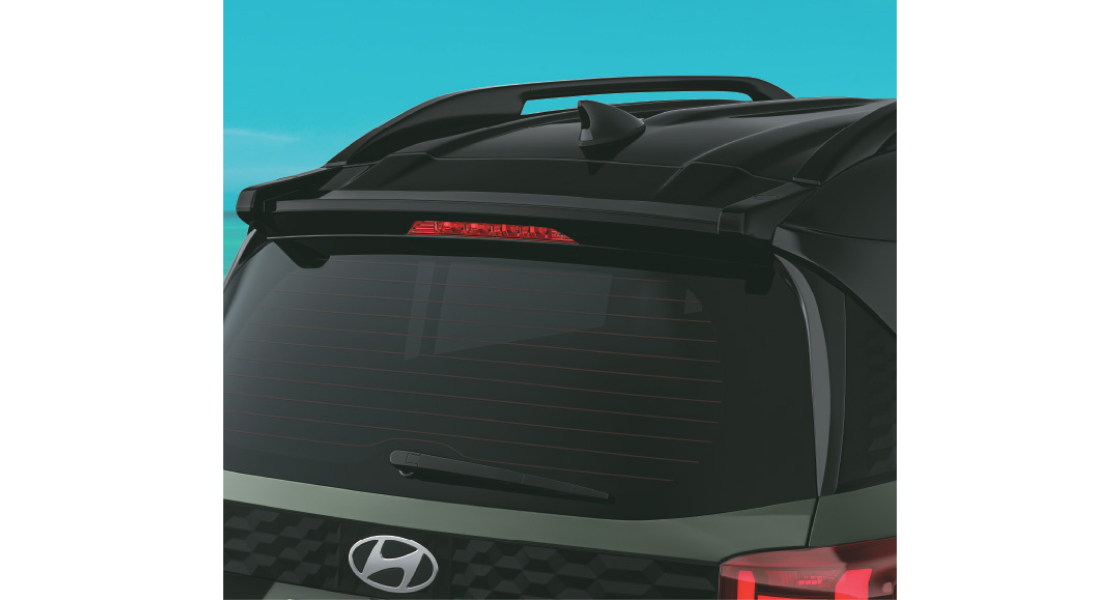 Painted black rear spoiler & roof rails